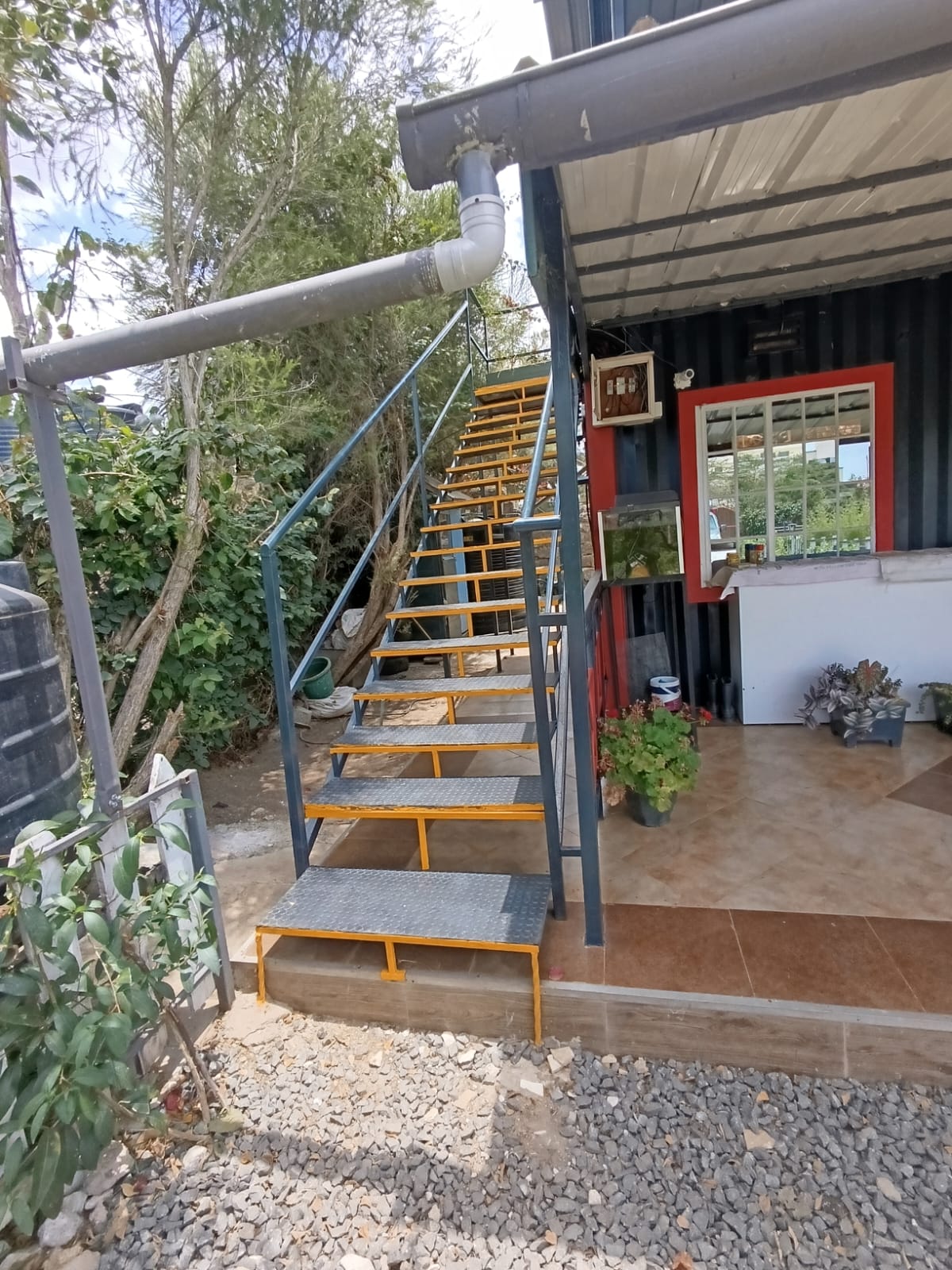 Stairs for access to the upstairs